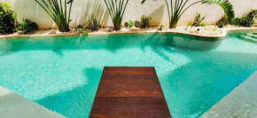 Hermoso estudio con acceso directo a la piscina